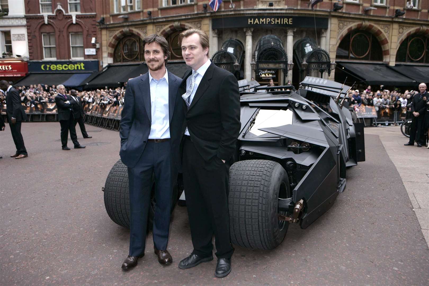 Star of the film Christian Bale with director Christopher Nolan and a Batmobile (Edmond Terakopian/PA)