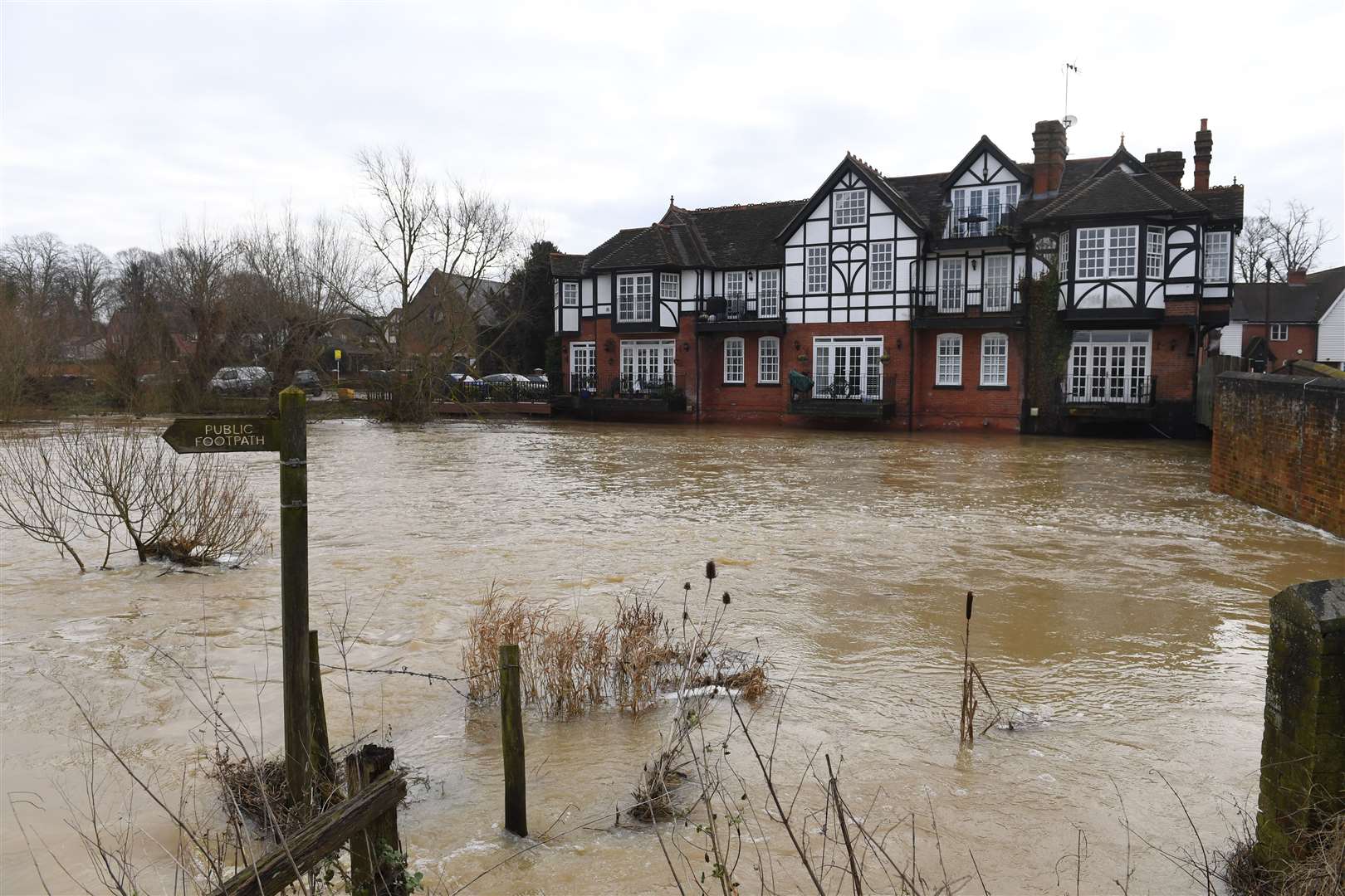 The River Roding after it burst its banks in Abridge, Essex (Stefan Rousseau/PA)