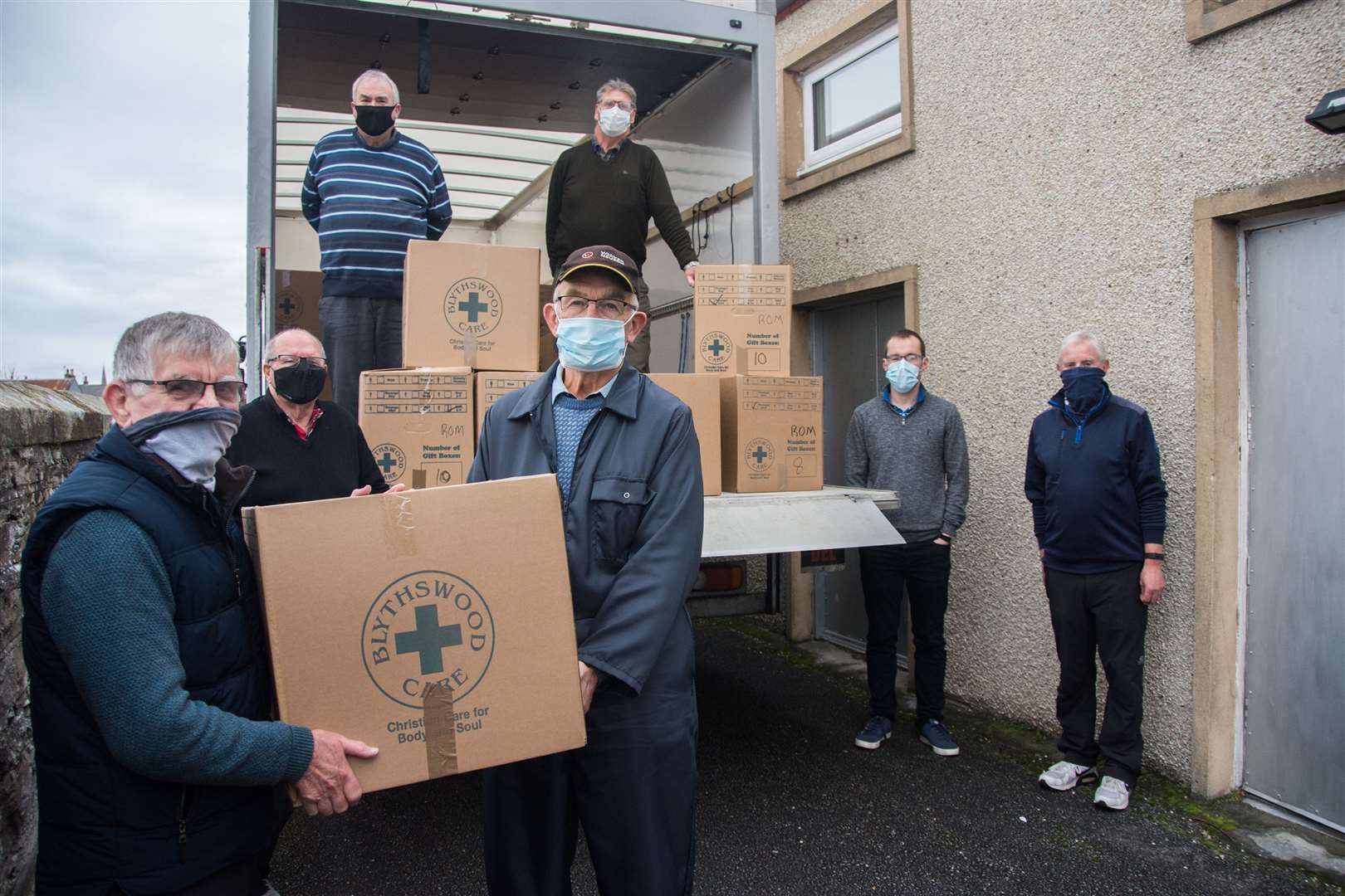 Buckie Blythswood Support Group organiser George Flett (left) helps volunteers load filled shoeboxes on their way to Romania after last year's appeal. Picture: Becky Saunderson