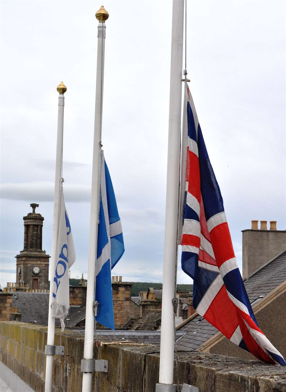 Moray Council flags at half mast.