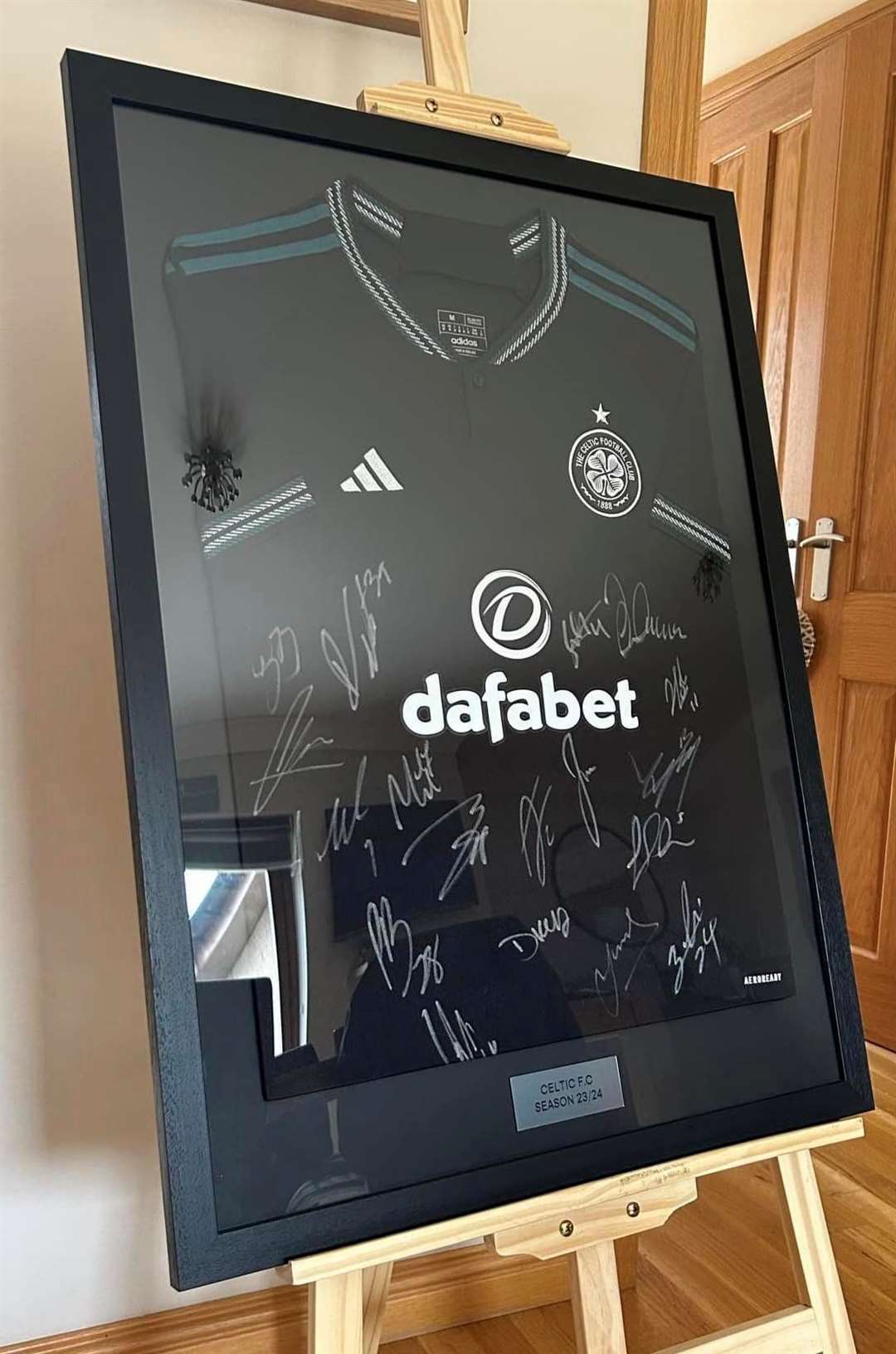 Several signed shirts are up for auction in aid of Men United.
