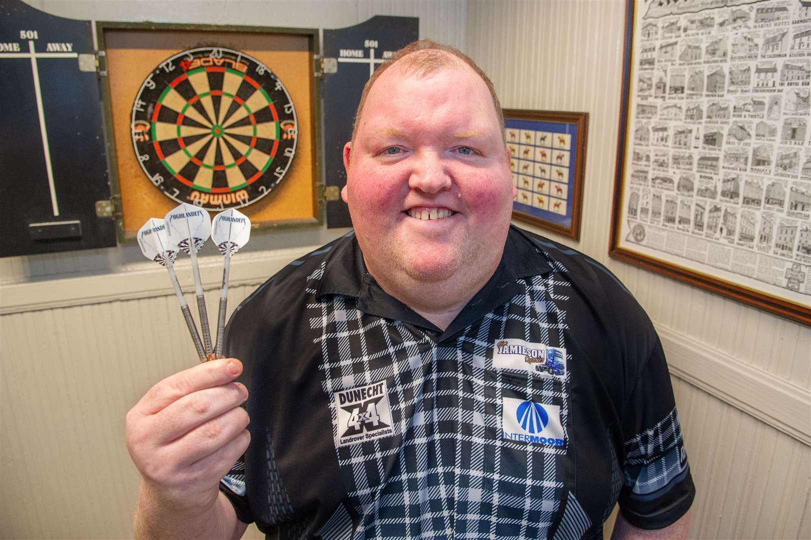 Huntly darts player John Henderson on home territory at the Crown Bar in the town. Picture: Daniel Forsyth.