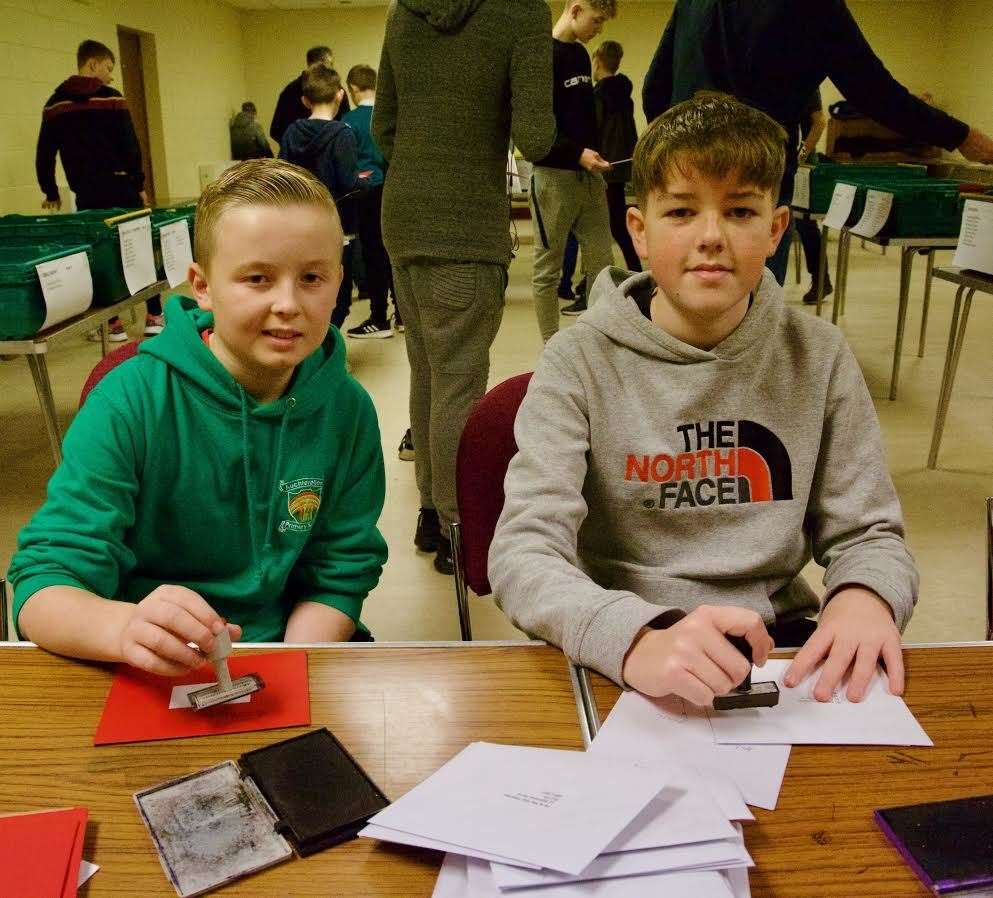 Busy stamping the submitted cards were Neil Lawrence and Joe Skivington. Picture: Phil Harman