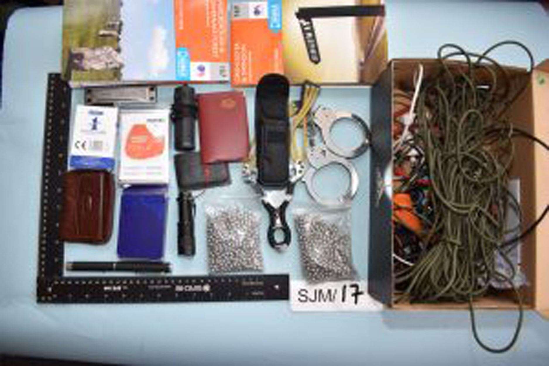 The contents of a shoe box belonging to Malakai Wheeler (Counter Terrorism Policing/PA)