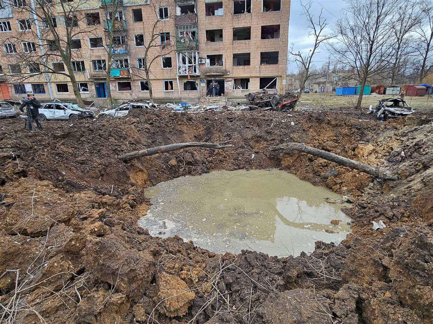 The crater caused by a missile strike near Andrew's hotel.