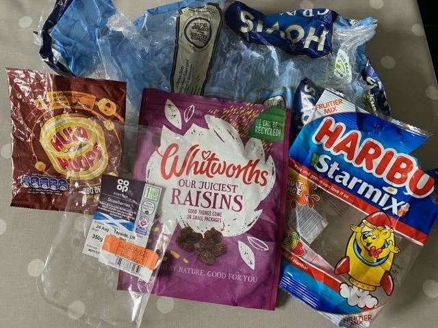 Items that can be recycled include crisp and sweet packets