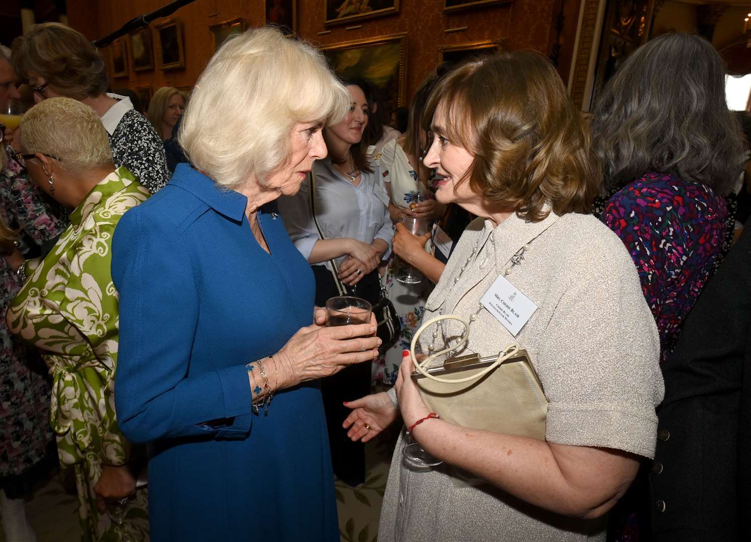 Camilla speaks to Cherie Blair at the reception (Eamonn M McCormack/PA)