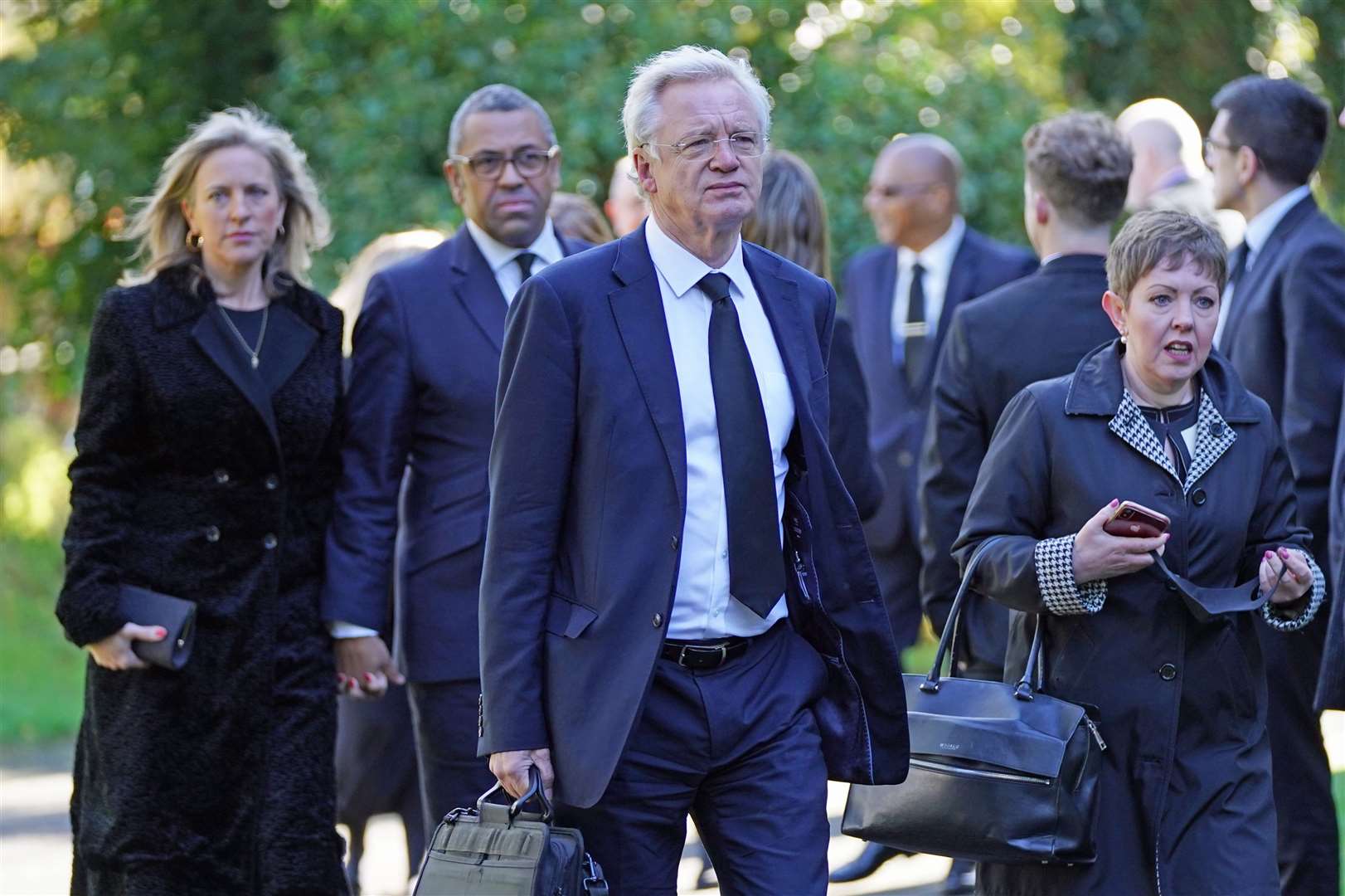 Former Cabinet minister David Davies (centre) arrives for the funeral of James Brokenshire in Bexley, south-east London (Stefan Rousseau/PA)