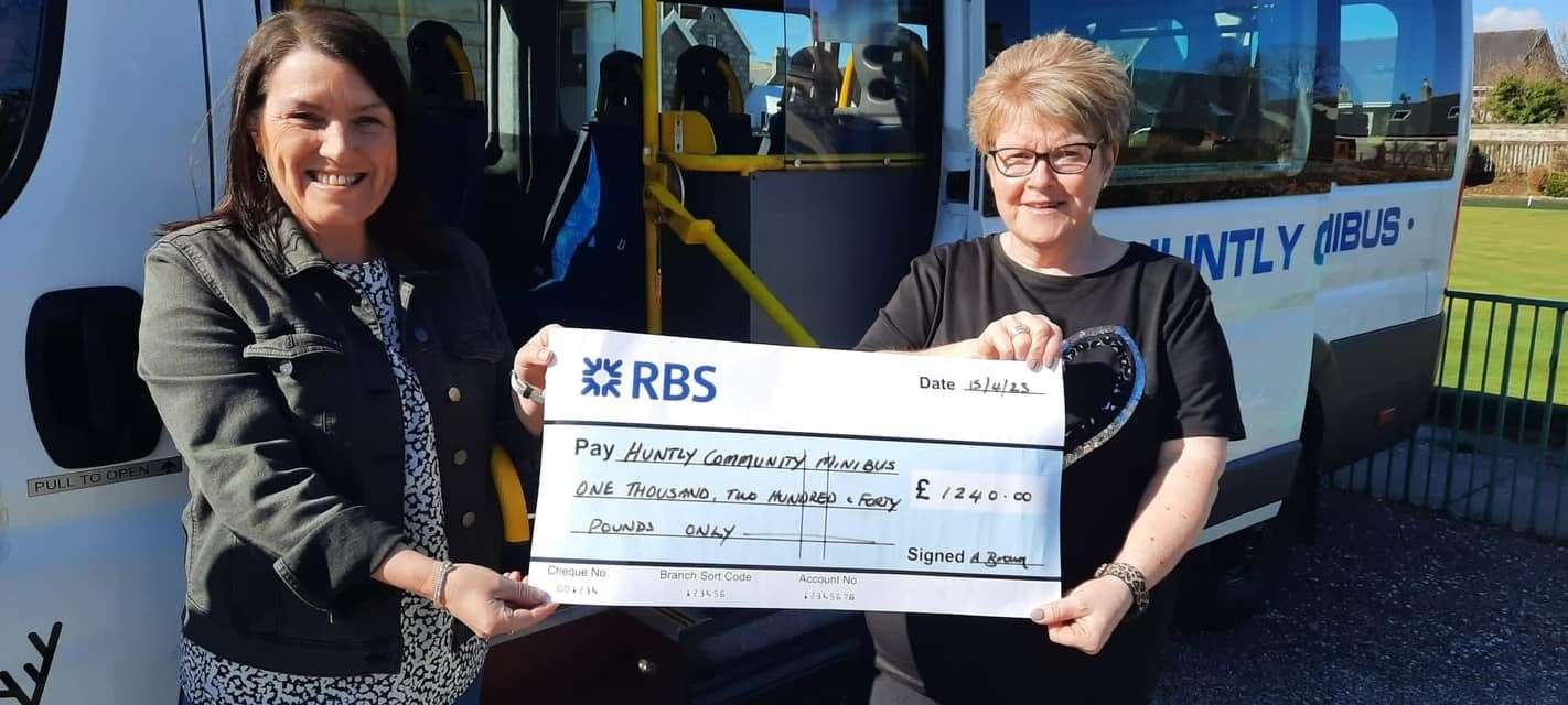 Minibus coordinator Debbie Haefner receiving the "brilliant" donation from ladies day organiser Audrey Brown...Picture: Allan Reid