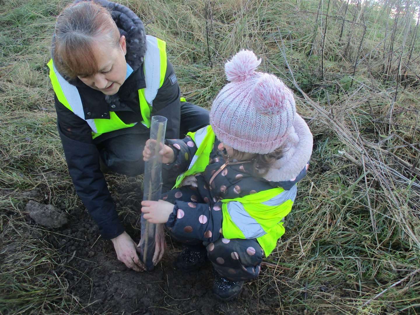 Keith Play Centre nursery manager Carlene Harding (left) helped children plant saplings as part of the Queen's platinum jubilee celebrations.