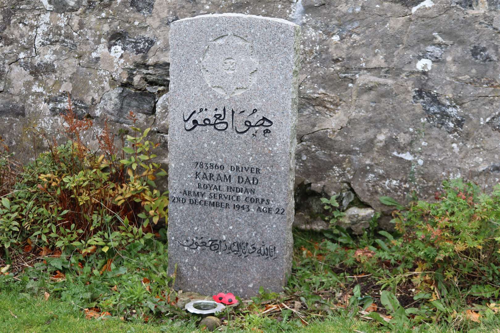 The gravestone of Karam Dad, buried in a corner at Grange Cemetery, with its Arabic inscription.