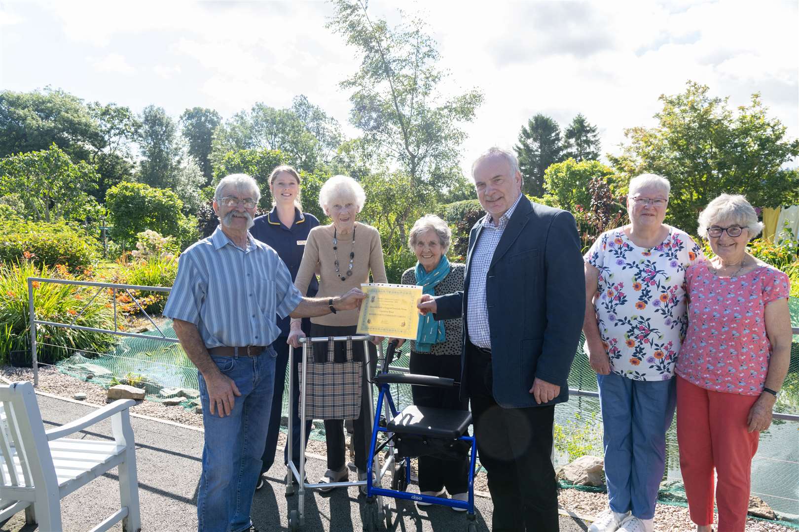 From left: Gardener Neil Bain, matron Katie Williams, Mary Whyte and Mary Meldrum from Alexander Scott's Hospital Eventide Home, who won Best Community Garden, with Huntly Community Council Chairman Tony Gill and judges Shona Newlands and Fiona Murray...Picture: Beth Taylor.