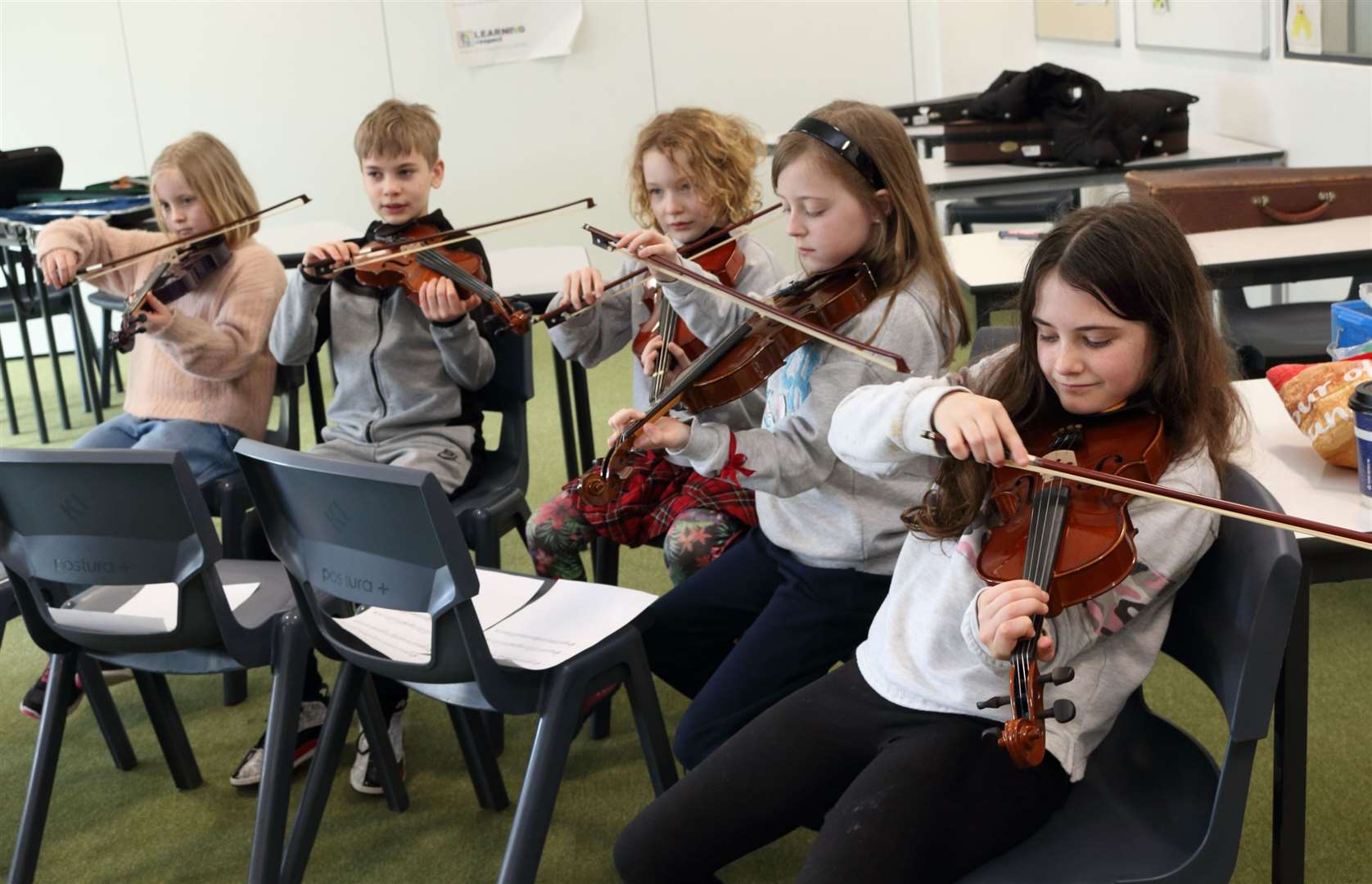 The fiddle class get in some more practice ahead of the Friday concert.
