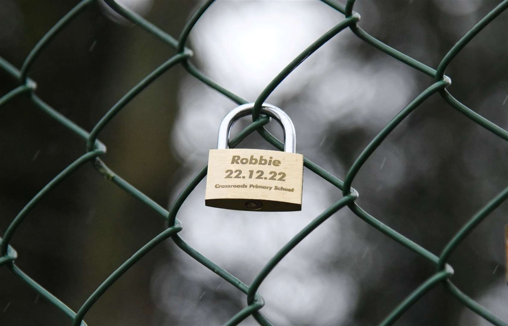Robbie's padlock on the fence at Crossroads Primary School. ..Picture: Beth Taylor.