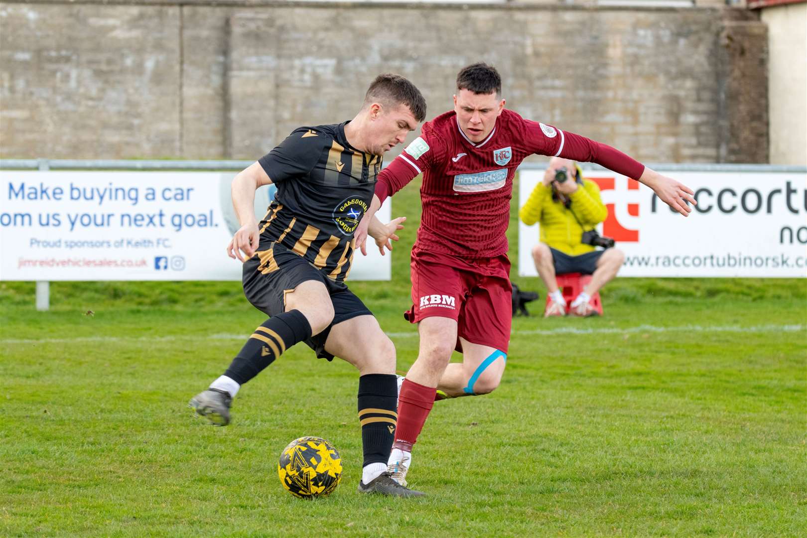 Huntly's Callum Murray is chased down by Keith's Connor Killoh. Keith F.C (1) v Huntly F.C (0) at Kynoch Park, Keith. Highland Football League.Picture: Beth Taylor
