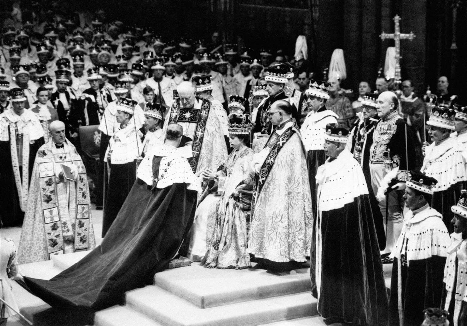 Queen Elizabeth II receives the homage of her husband, the Duke of Edinburgh, at her coronation (PA)
