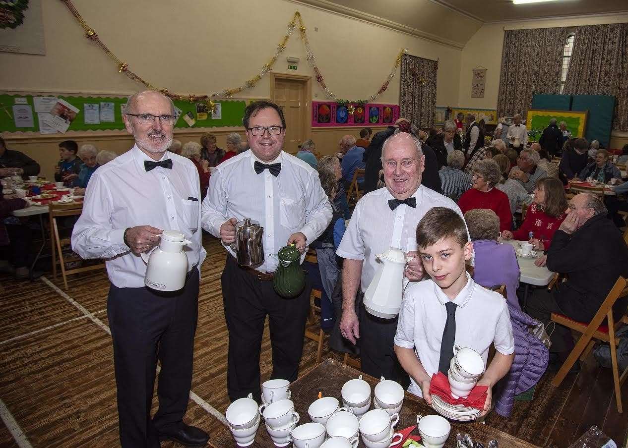 Serving up a treat at St Andrew's Church's coffee morning were Doug Connon, Victor Smith, Kenny Beaton and Aiden Smith. Picture: George Murdoch