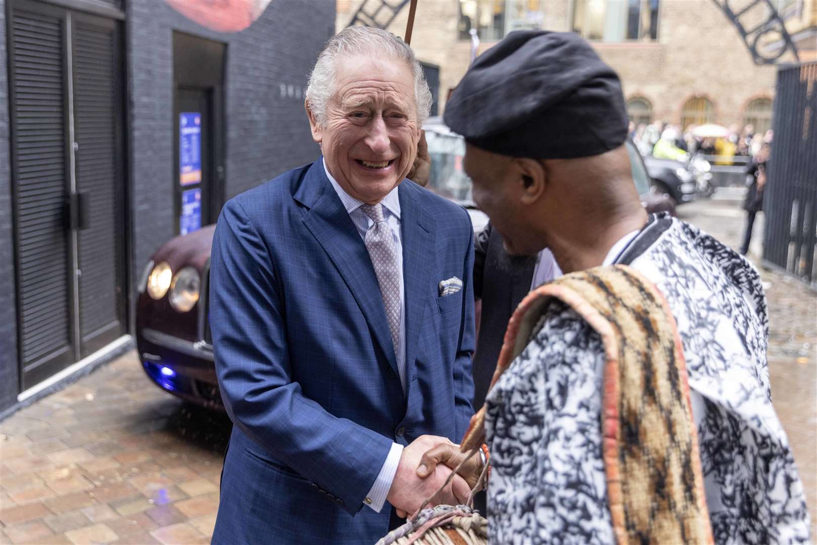 The King meets the Oduduwa Talking Drummers from Yoruba land, Nigeria (Jack Hill/The Times/PA)