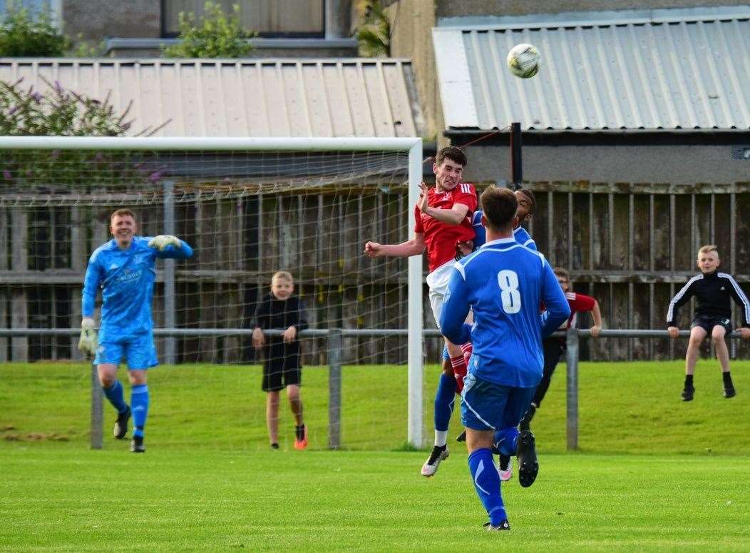 Jaydan Bradford heads the ball clear for Deveronvale. Picture: Michael Cox