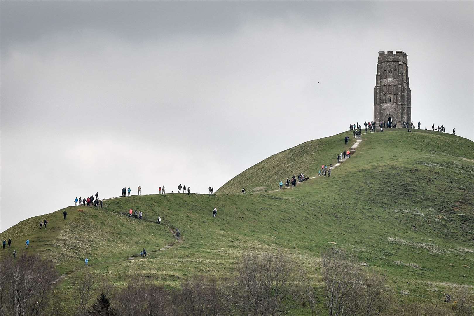 Glastonbury Tor has been linked to slave reparations (PA)