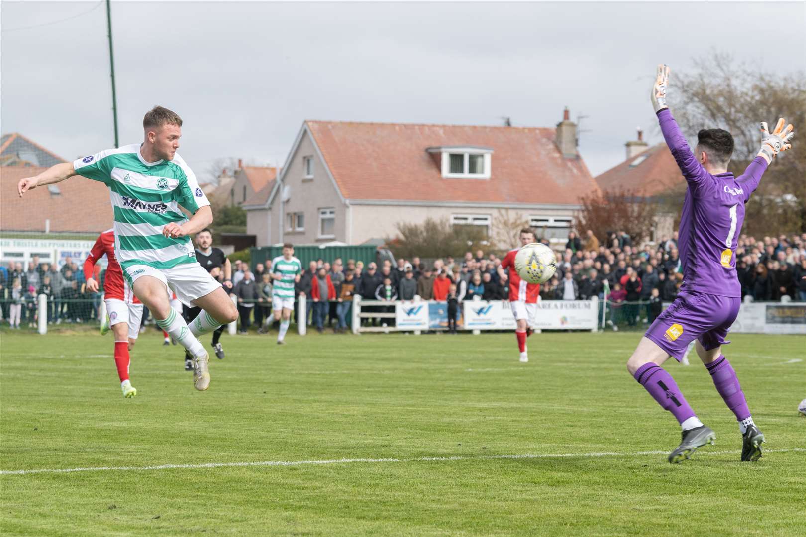 Buckie's Josh Peters making a solid attempt for goal. ..Buckie Thistle F.C. v Brechin City F.C. Highland League Final at Victoria Park. ..Picture: Beth Taylor.