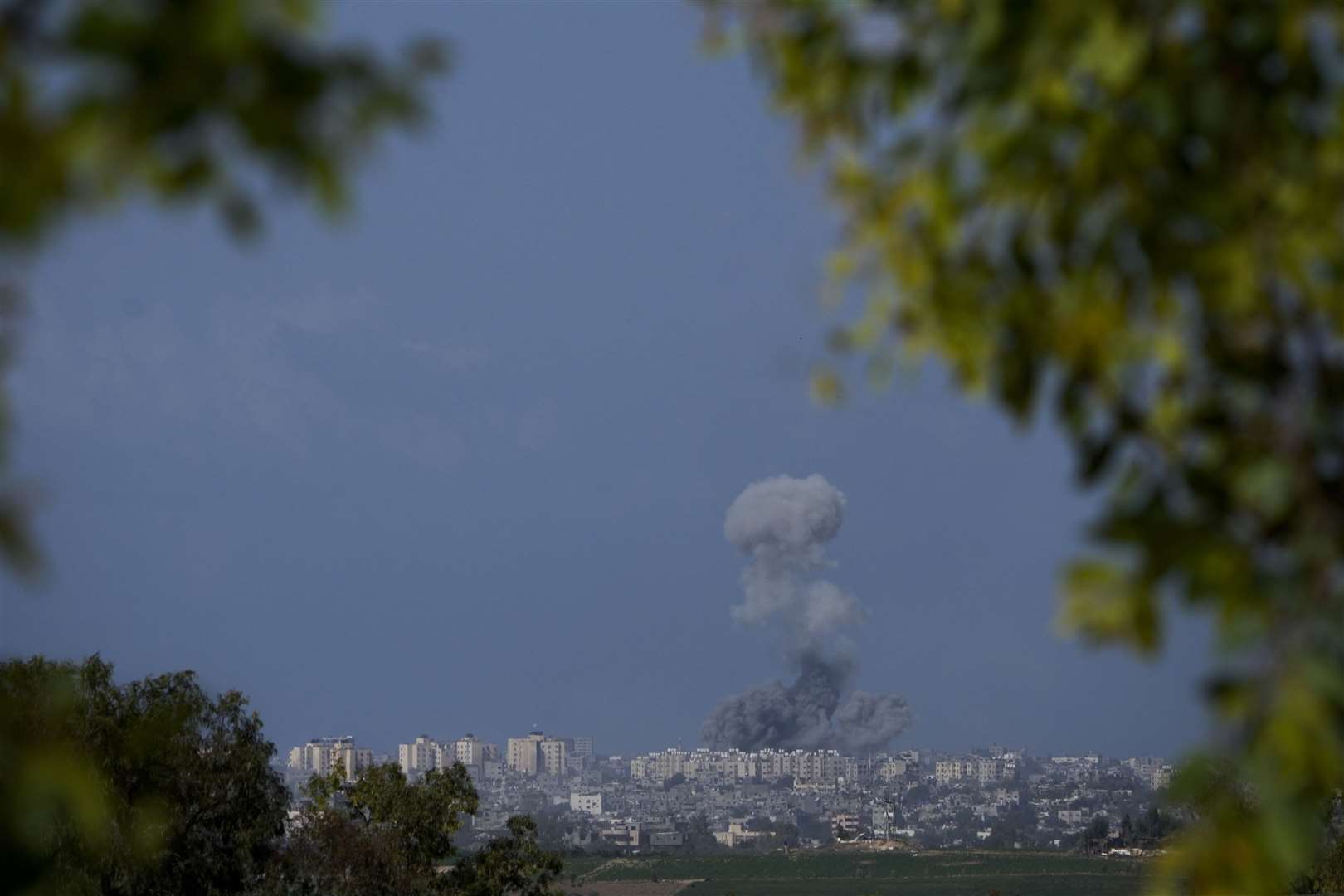Smoke rises following an Israeli airstrike in the Gaza Strip on Thursday (Maya Alleruzzo/AP)
