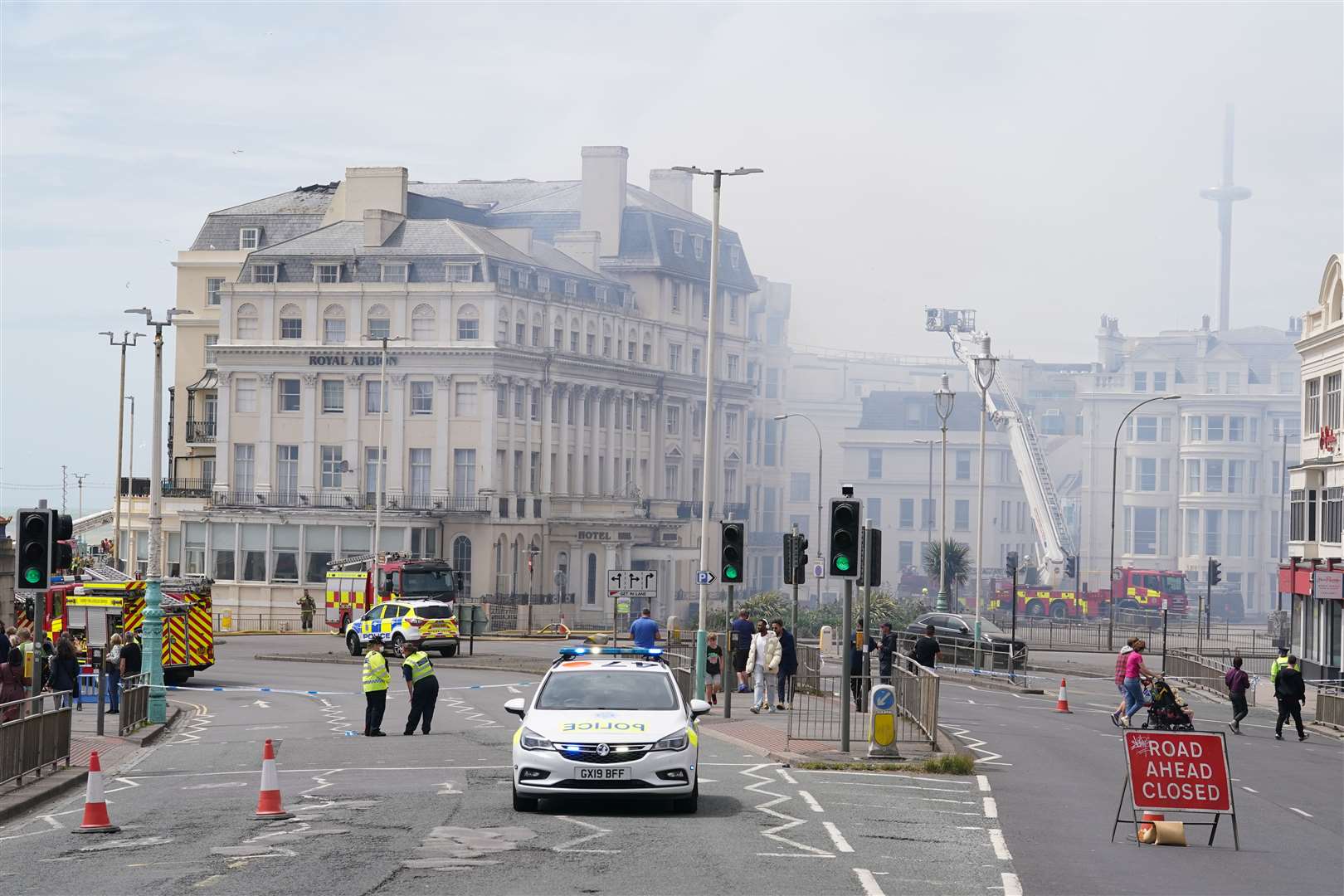 Police and firefighters at the scene in Brighton after a fire at the Royal Albion Hotel (Gareth Fuller/PA)