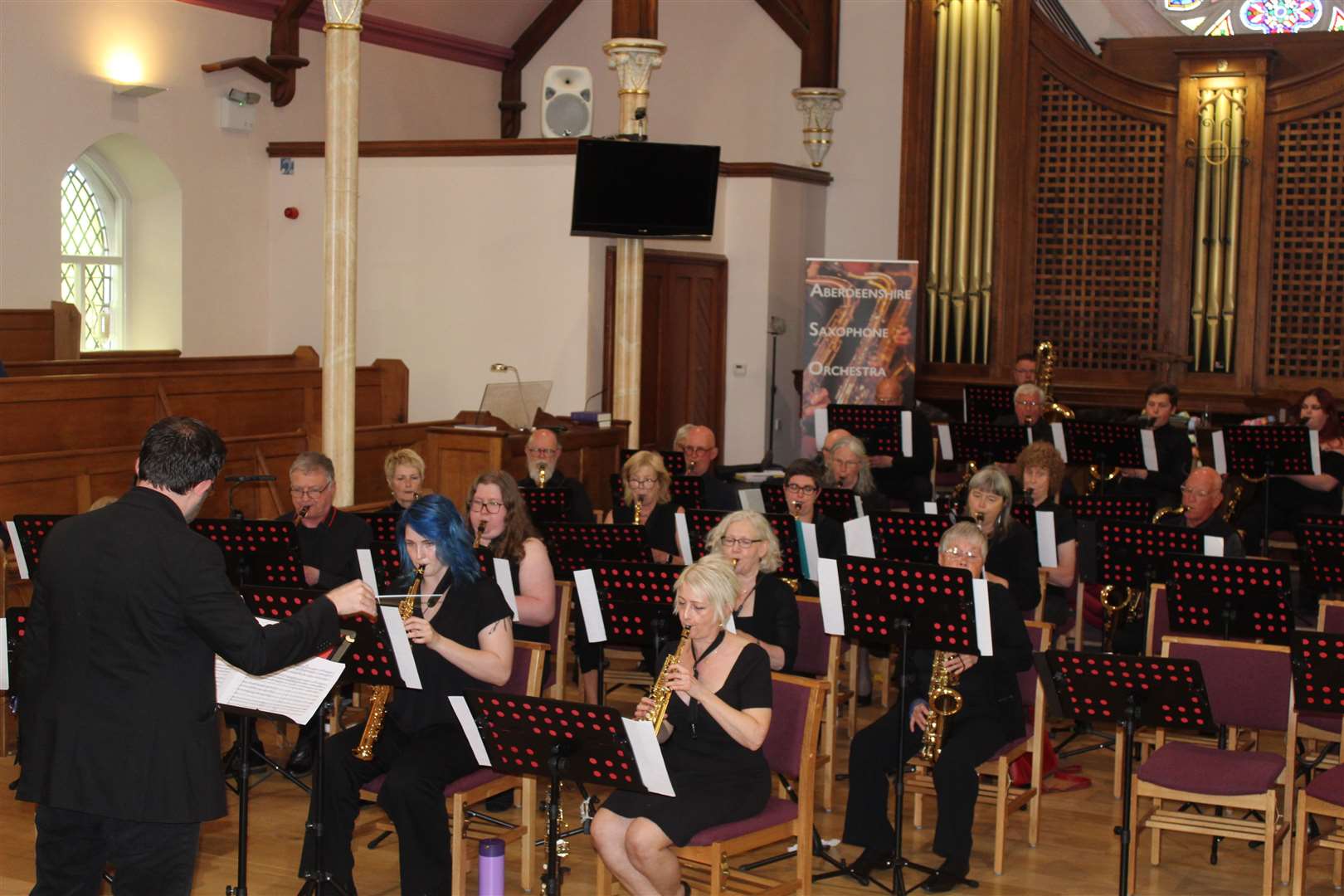 Members of the saxophone orchestras getting ready for their concert in the Acorn centre, West High Street, Inverurie on Saturday night. Picture: Griselda McGregor