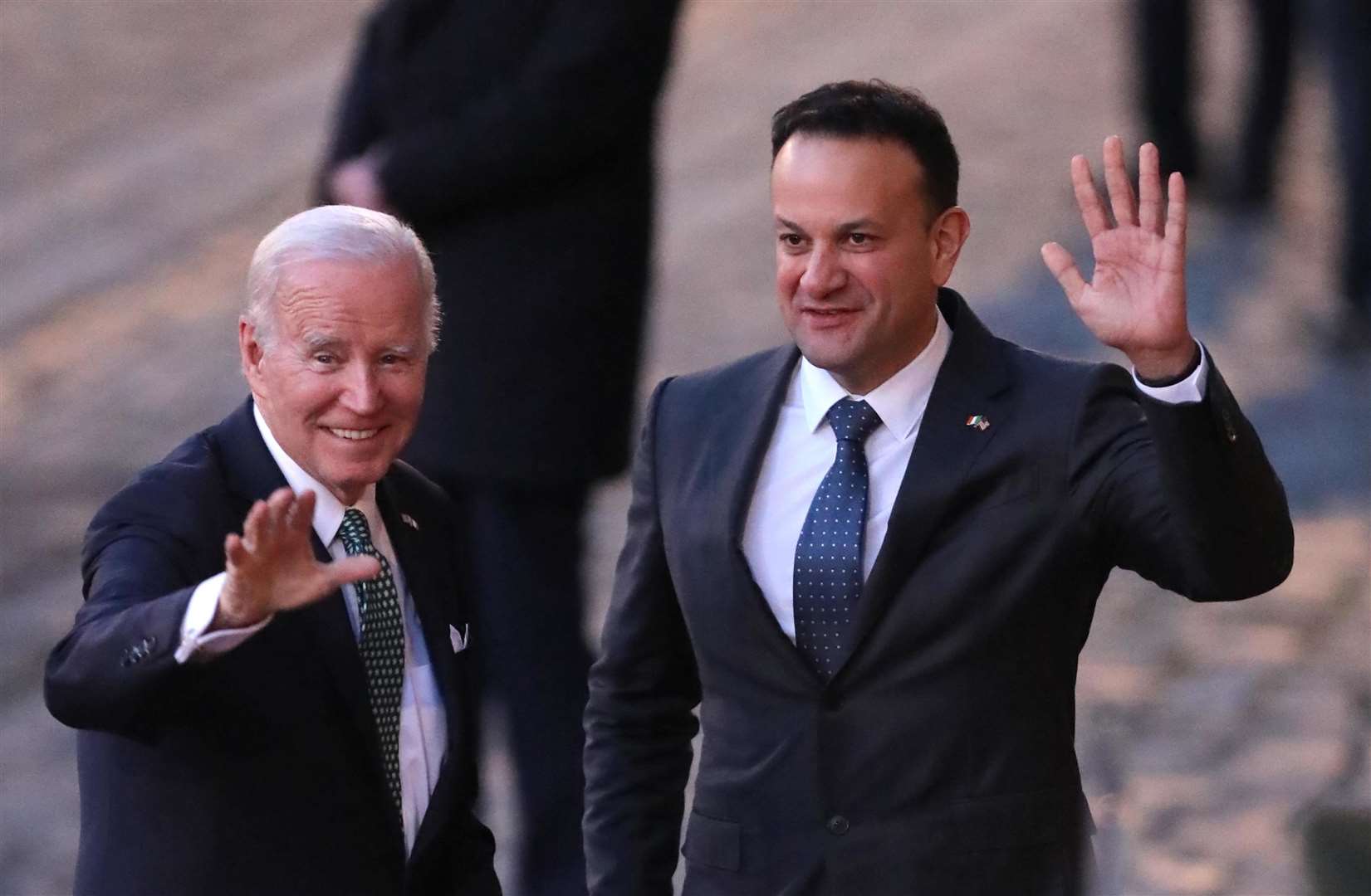 Joe Biden is greeted by Leo Varadkar as he arrives for a state dinner at Dublin Castle (Damien Storan/PA)