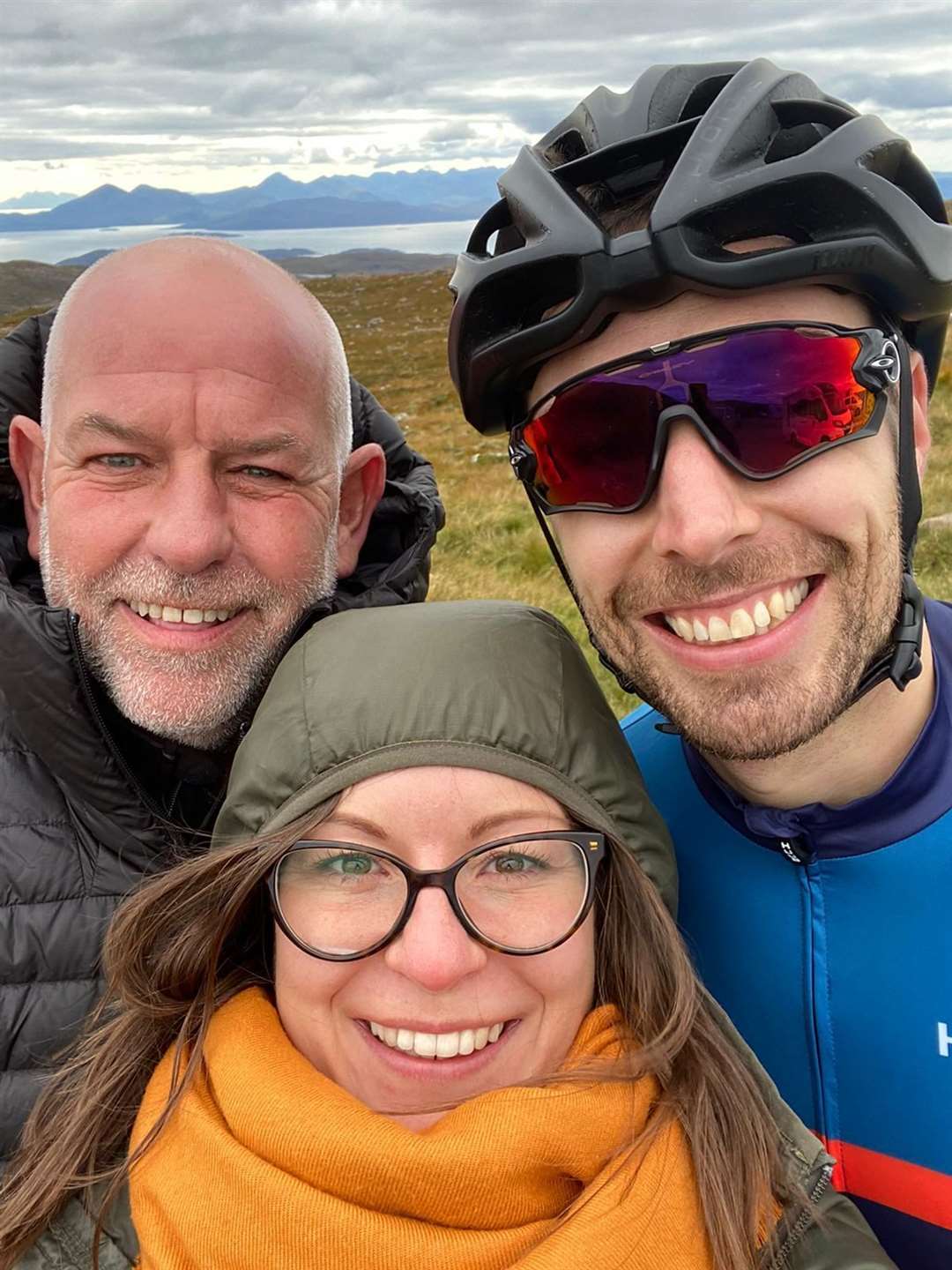 Sam with his dad John and wife Tessa on a stop.