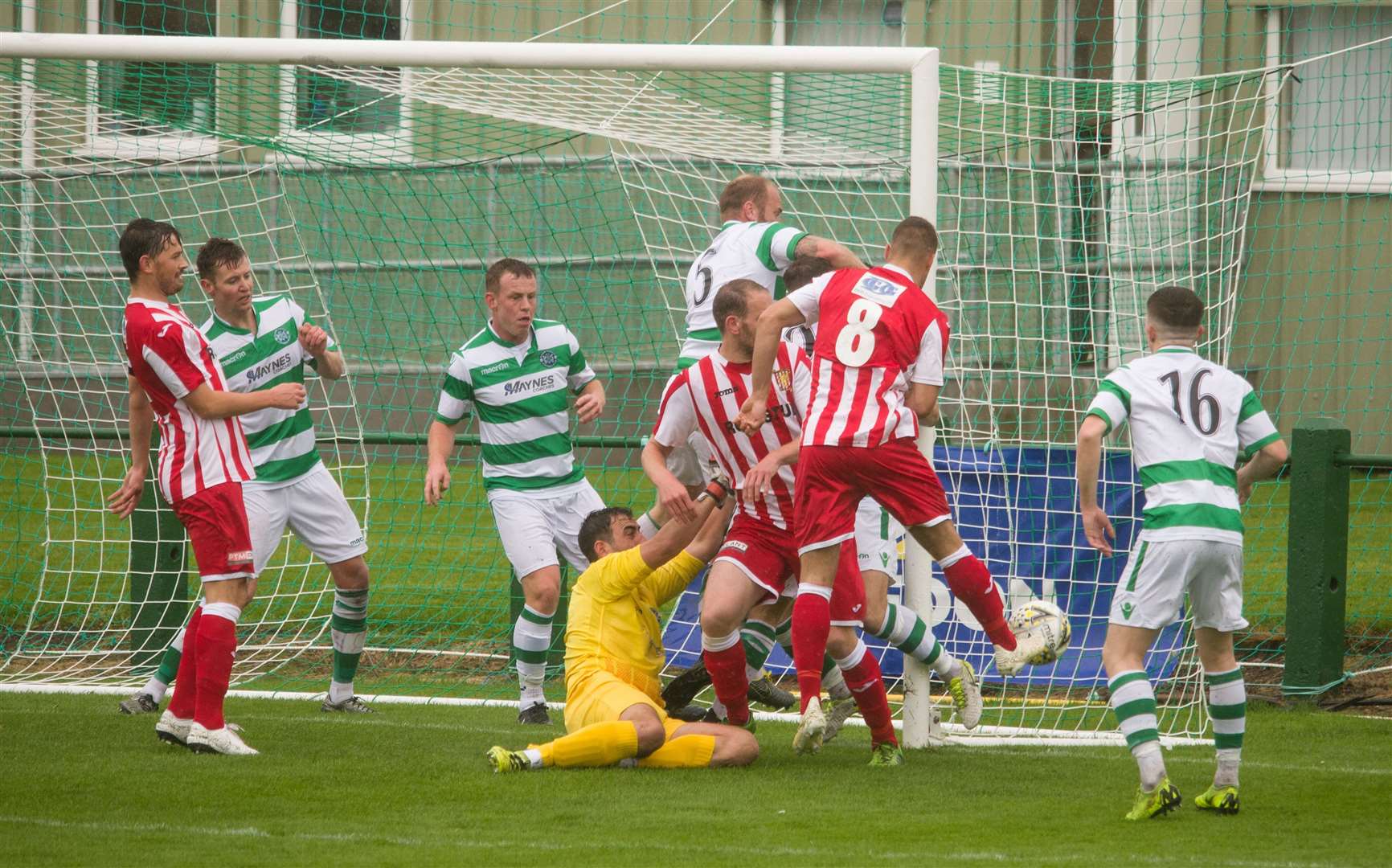 A goalmouth scramble as Buckie repel a Formartine attack. Pic: Allan Robertson