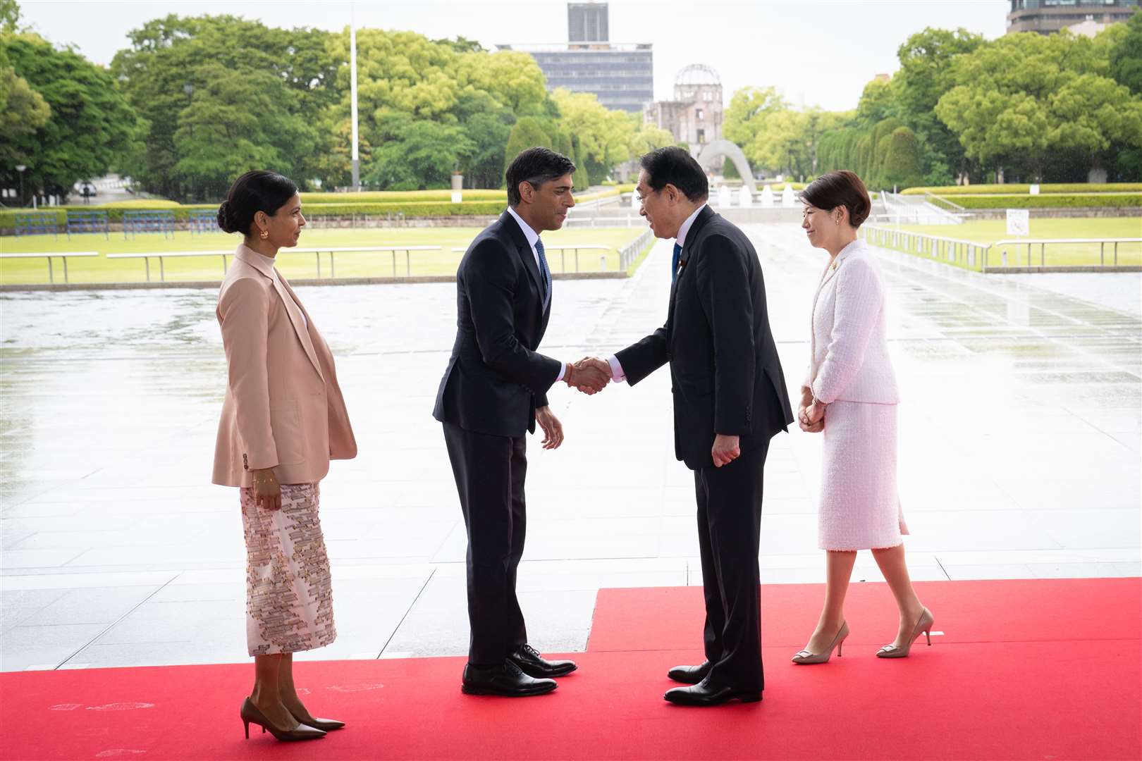 Prime Minister Rishi Sunak and his wife Akshata Murty are welcomed by Japan’s Prime Minister Fumio Kishida and his wife Yuko Kishida at the Peace Memorial Park during the G7 Summit in Hiroshima (Stefan Rousseau/PA)