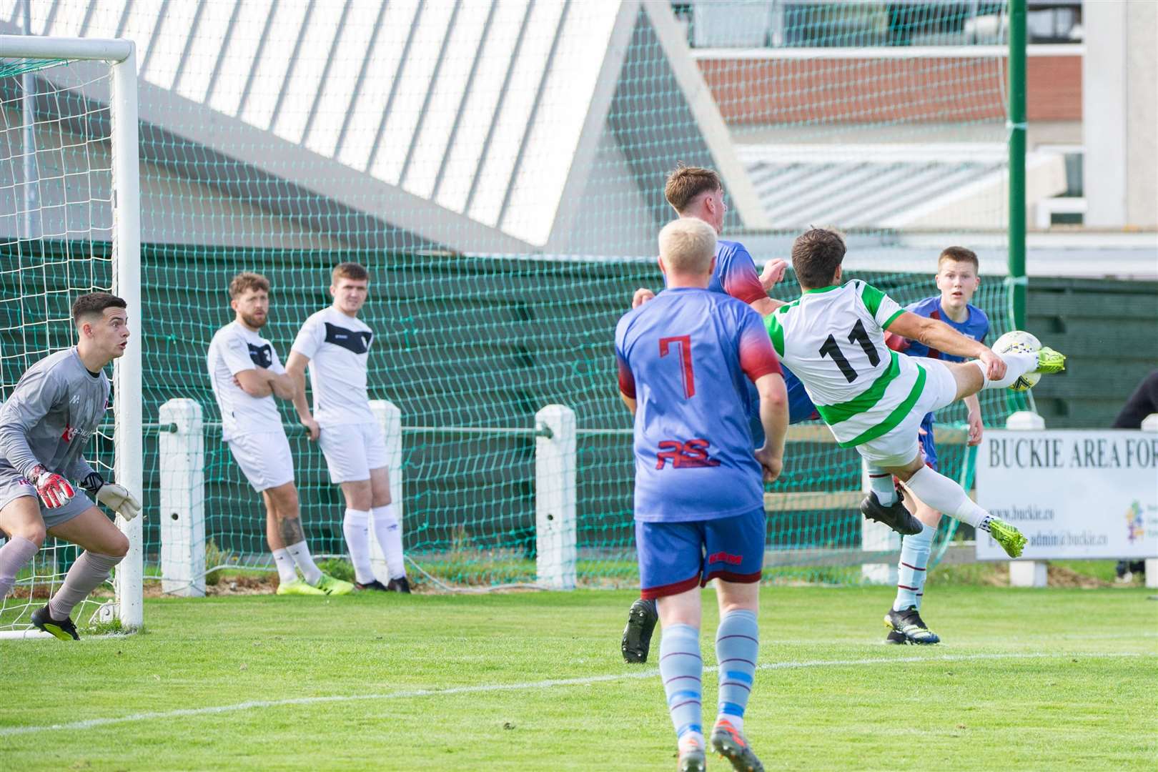 Buckie's Sam Urquhart about to net one of his hat-trick of goals against Keith this season..Picture: Daniel Forsyth..