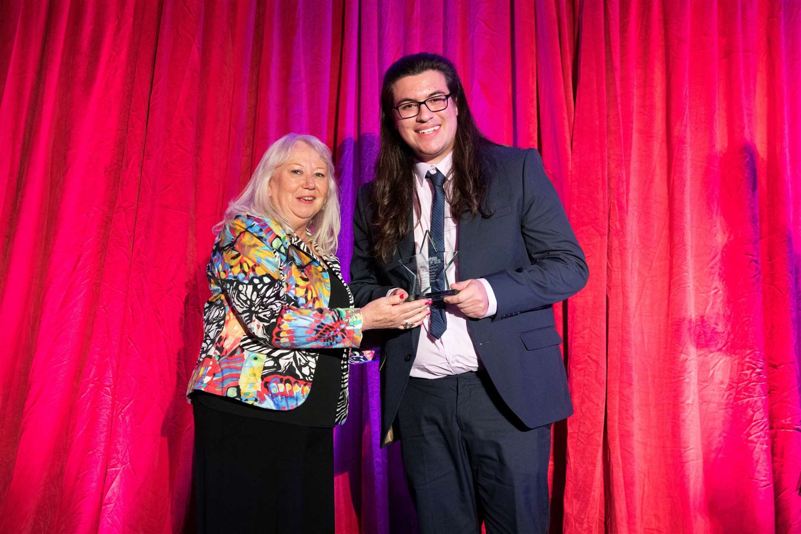 Ben Stewart, Forres Academy, received the secondary school pupil of the year award 2023 from Jackie Andrews, head of Academic Partnerships at UHI Moray, award sponsor. Picture: Beth Taylor