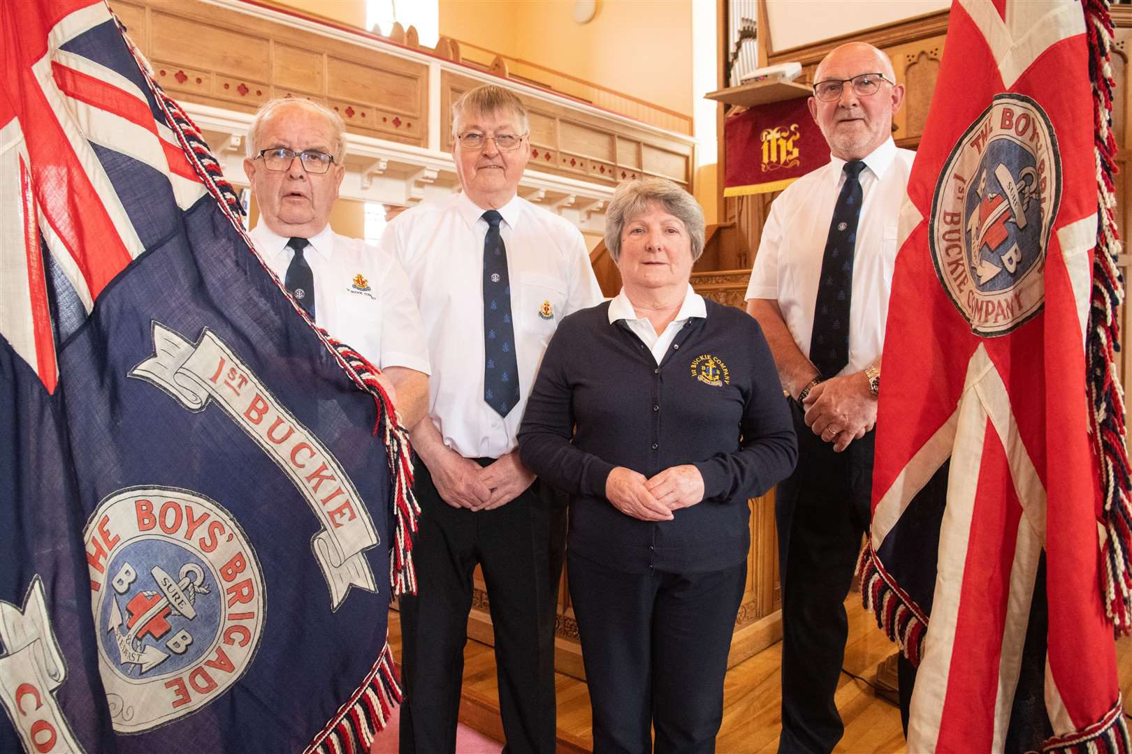 Celebrating news of the Queen's Award are 1st Buckie Company Boys' Brigade Captain Alan McIntosh (second left) and fellow officers Gordon Pirie (left), Jennifer McIntosh and Grant Stewart. Picture: Daniel Forsyth
