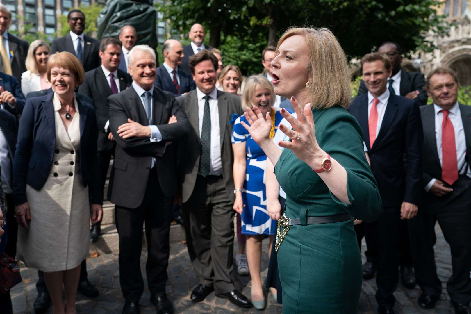 Foreign Secretary Liz Truss celebrates with supporters after making it to the final of the Tory leadership contest along with Rishi Sunak (Stefan Rousseau/PA)
