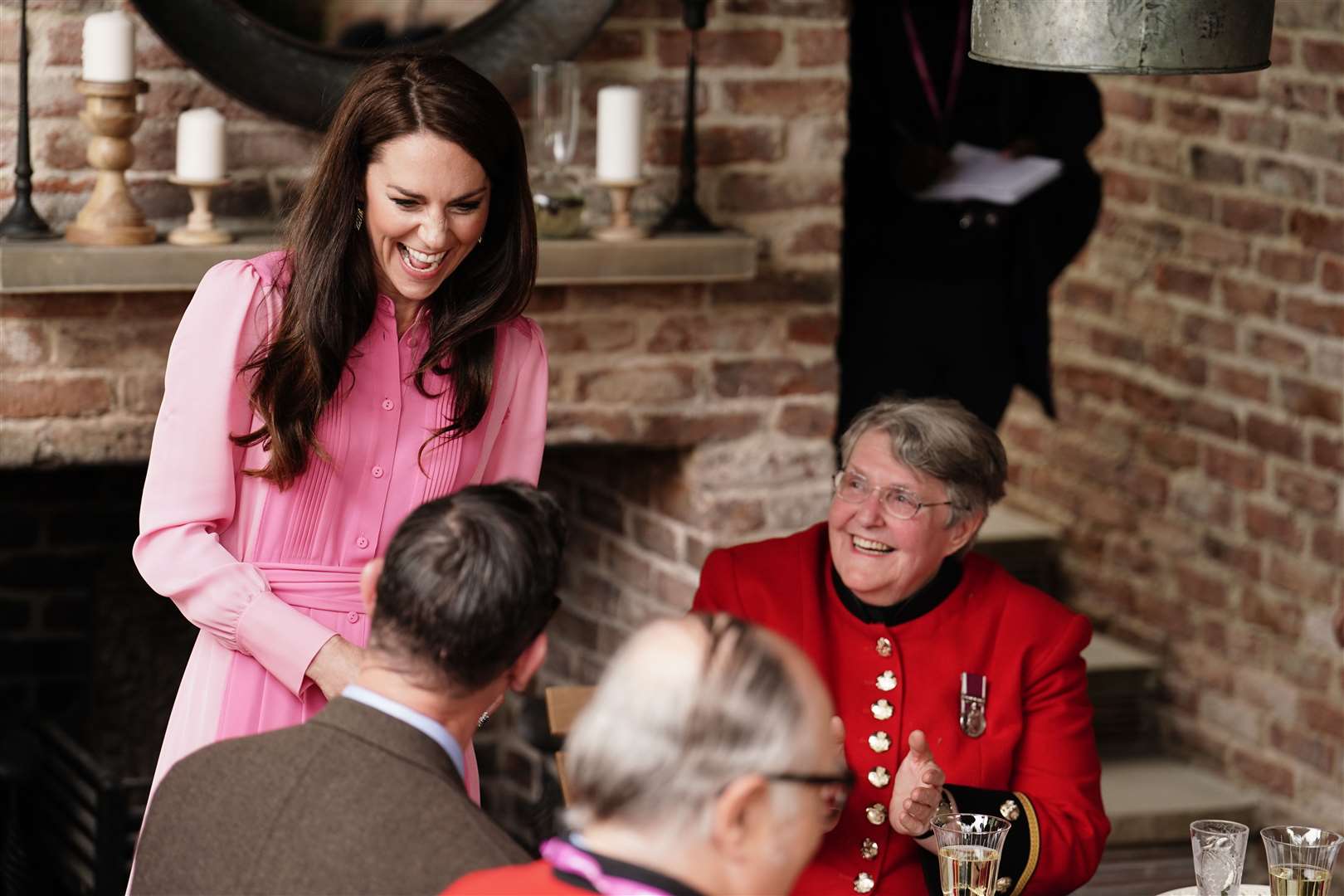 The Princess of Wales speaks to the Chelsea Pensioners, after taking part in the first Children’s Picnic at the RHS Chelsea Flower Show (Jordan Pettitt/PA)