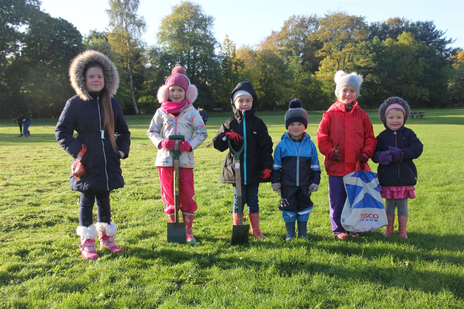 Planting bulbs and wildflowers in the Haughs was a community effort. Pictures: Kirsty Brown