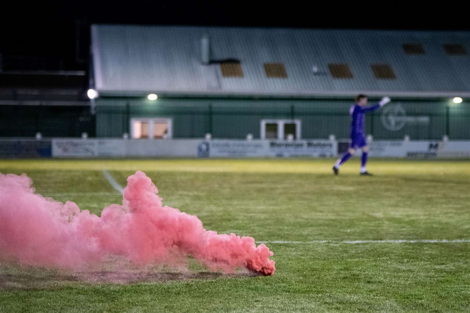 Smoke bombs were thrown on the pitch.Picture: Daniel Forsyth.
