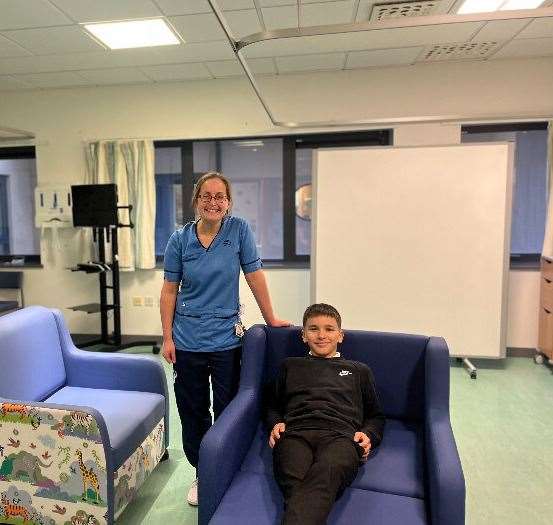 Filip presented the chair beds to HDU nurse Natalie Gallan.