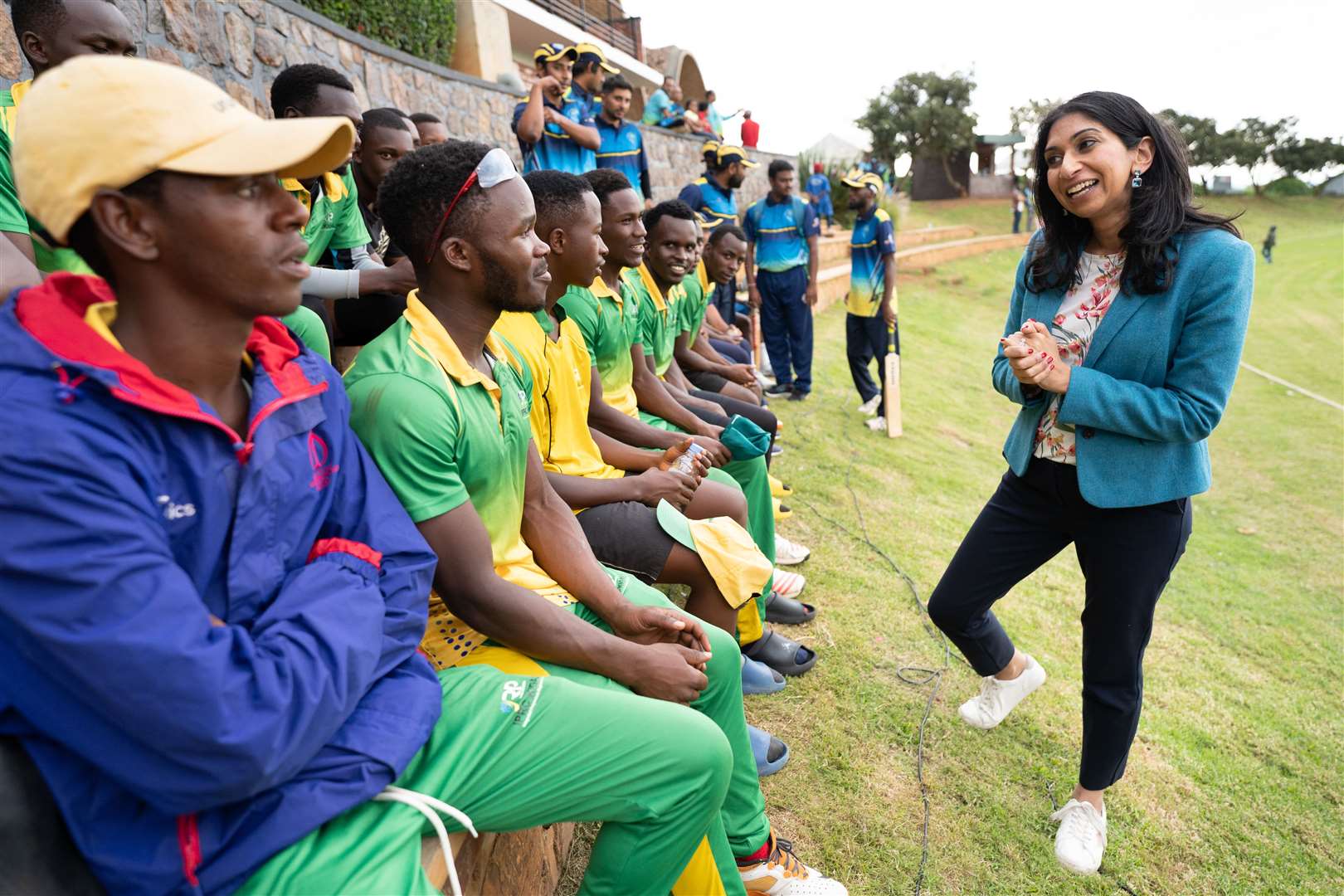 Suella Braverman meets cricketers at Gahanga International Cricket Stadium in Kigali during her visit to Rwanda (Stefan Rousseau/PA)