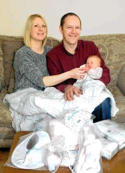 Tracey and James with baby Hope. Photo: Becky Saunderson