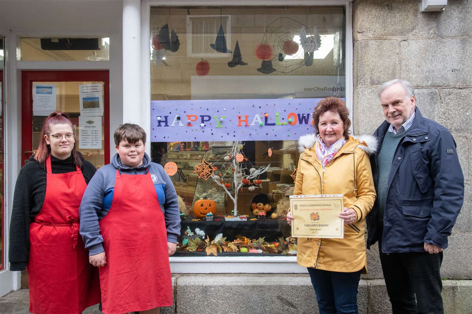 From left; Danielle Yates, Ross McKay, Diane Wood and Tony Gill (Huntly Community Council)...Sinclair's Bakery on Duke Street is the winner of the Huntly Community Council's Halloween Window Competition...Picture: Daniel Forsyth..