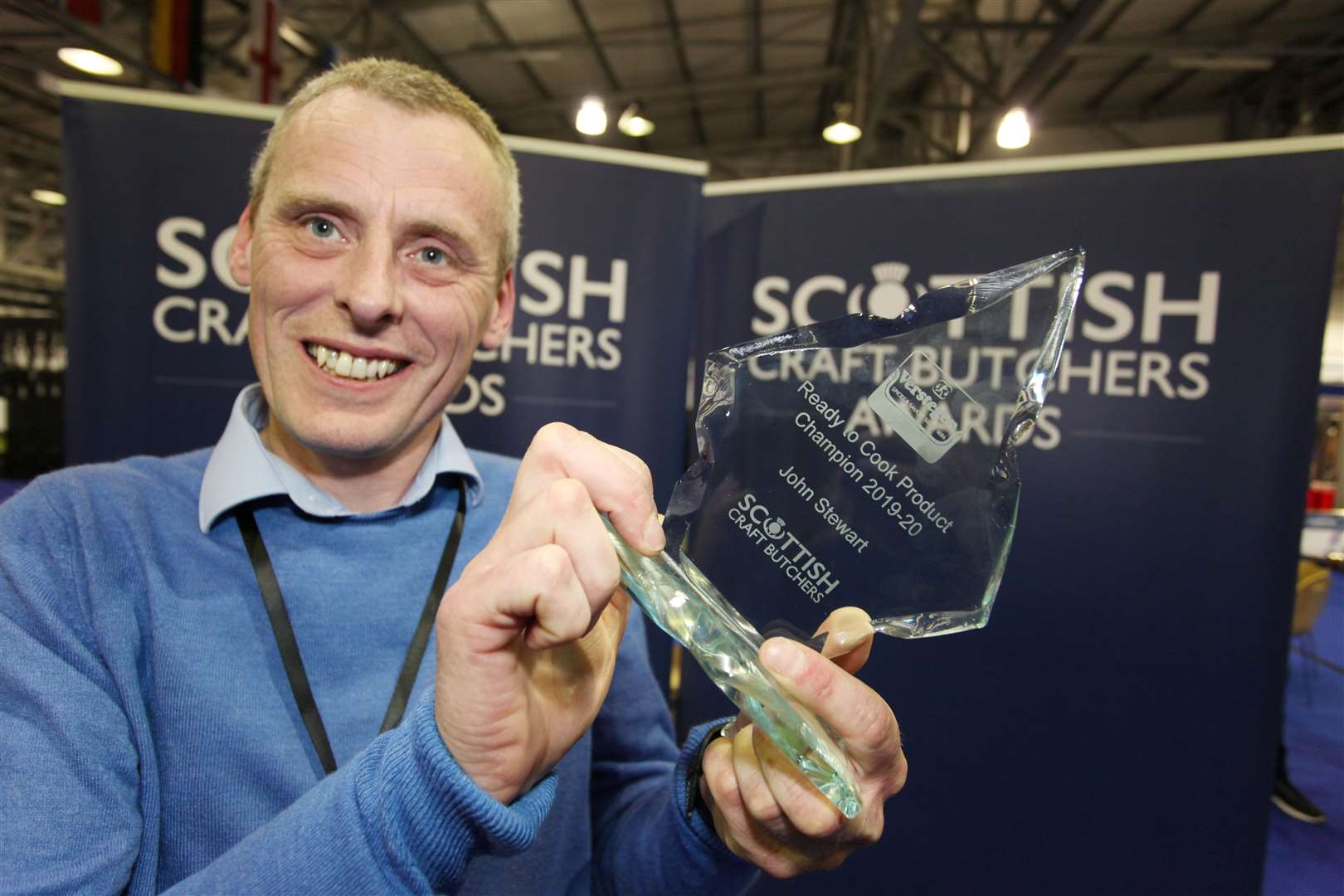 John Stewart Butchers owner Andy Grant with the diamond award for Scotland's best ready-to-cook product.