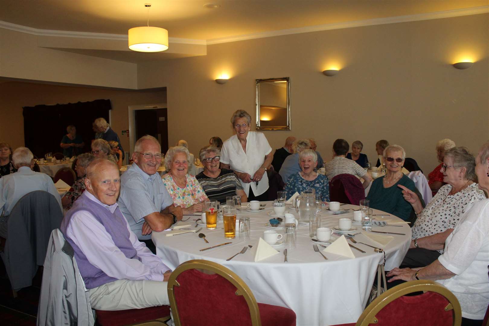 Some of the guests with chairperson Elinor Strachan at last weeks Age Concern summer party at the Kintore Arms, High Street, Inverurie. Picture: Griselda McGregor