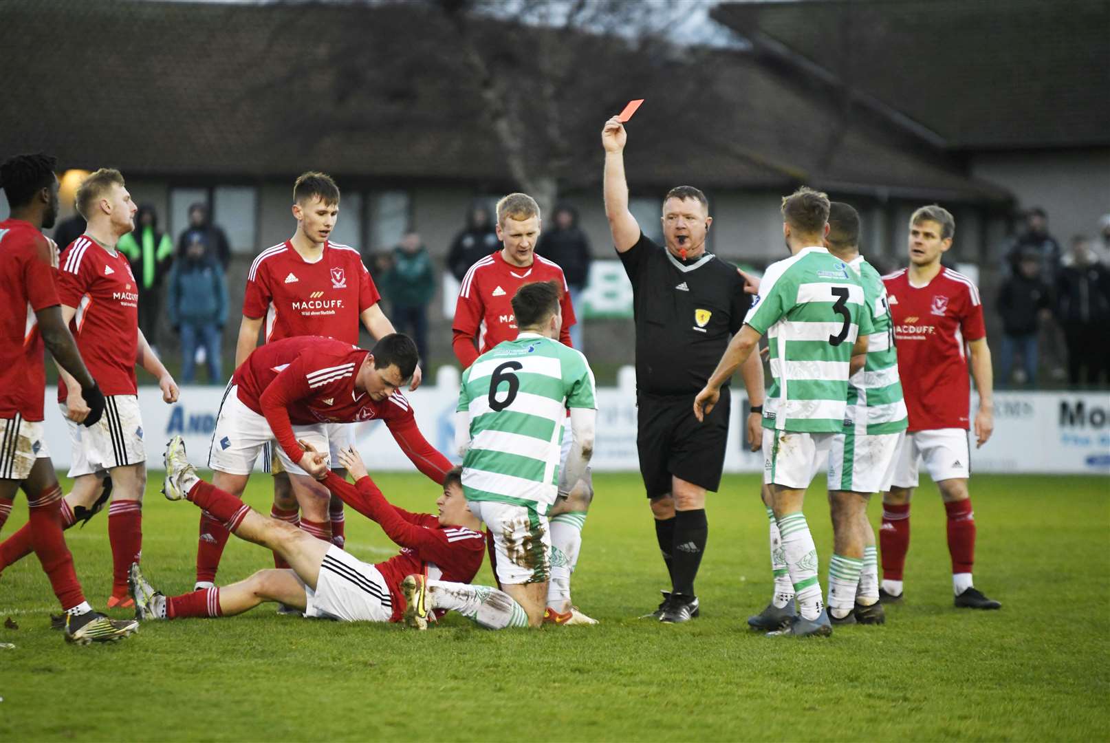 Buckie Thistle's Jack Murray for his foul on Deveronvale's Michael Watson. ..Buckie Thistle F.C. v Deveronvale F.C. ..Picture: Beth Taylor.