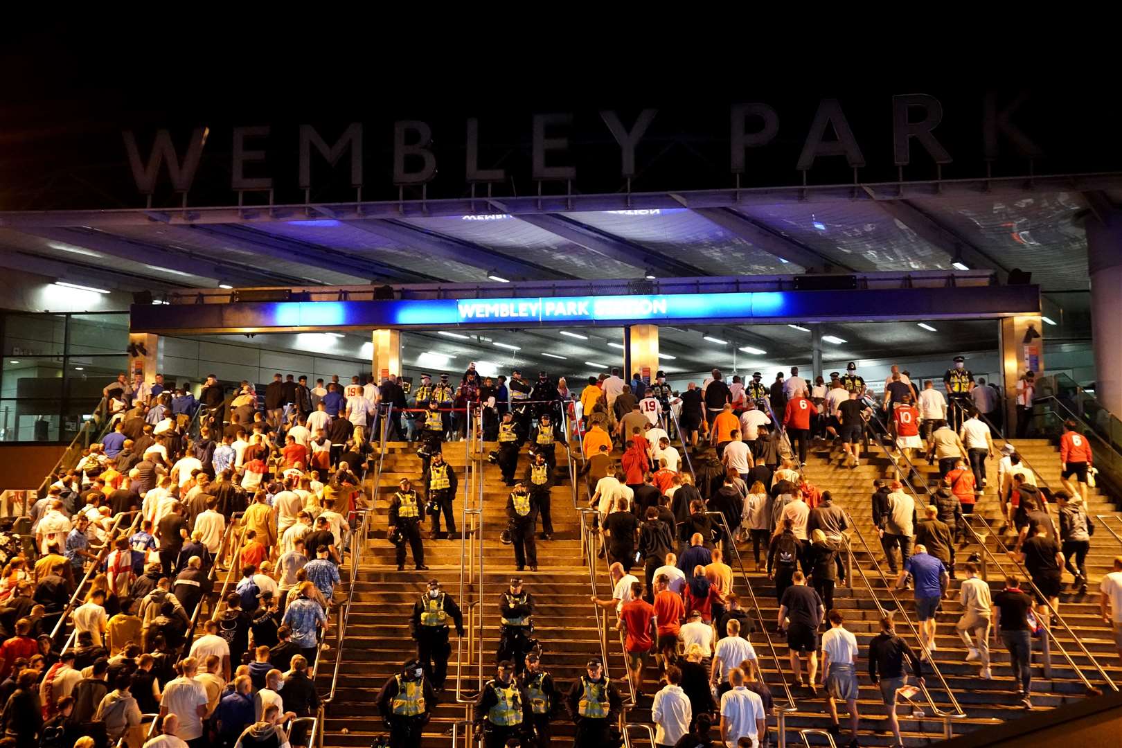 England fans outside Wembley Park station after the Uefa Euro 2020 final defeat (Zac Goodwin/PA)
