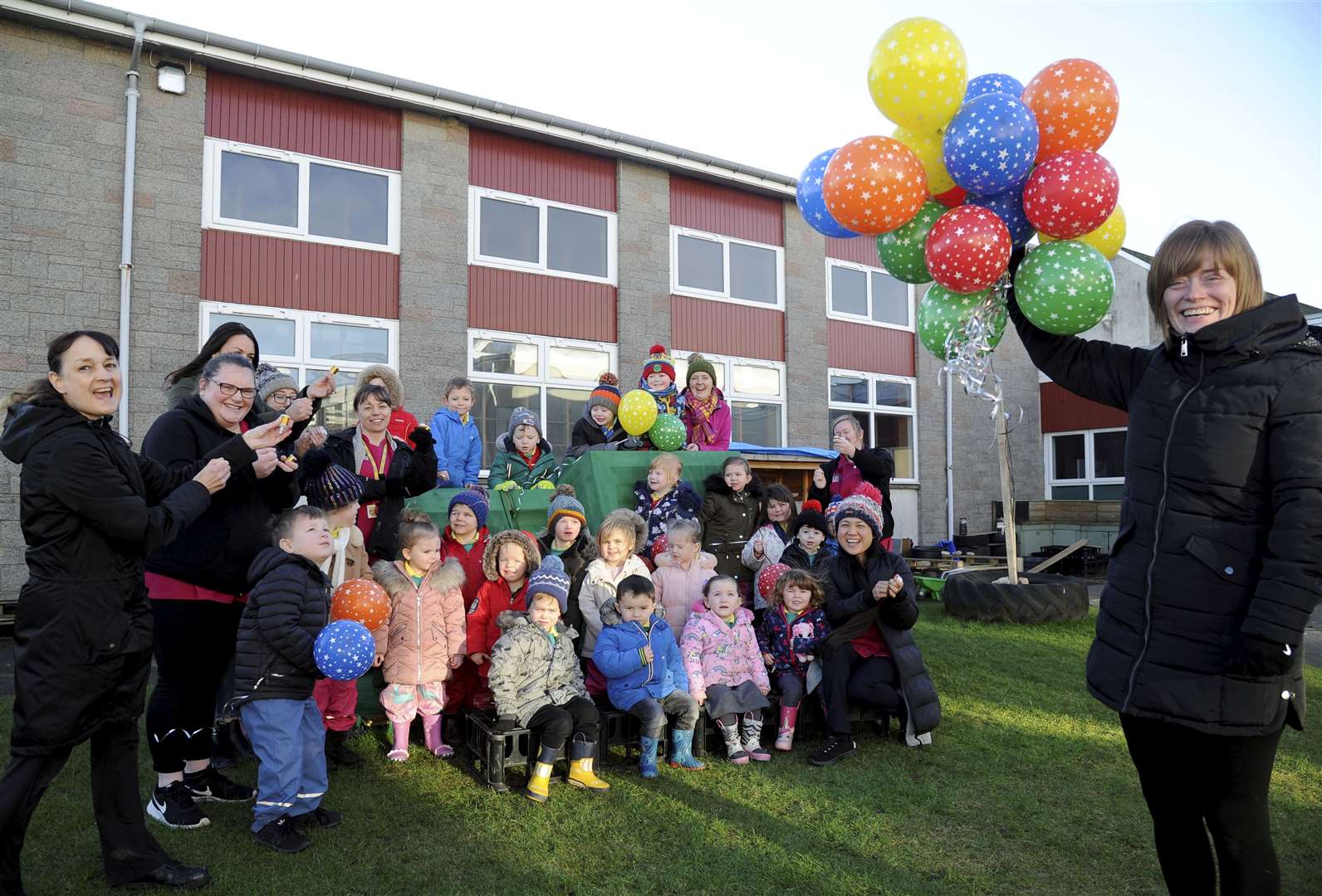 Keith Play Centre staff and children celebrate their environment award. Picture: Eric Cormack.