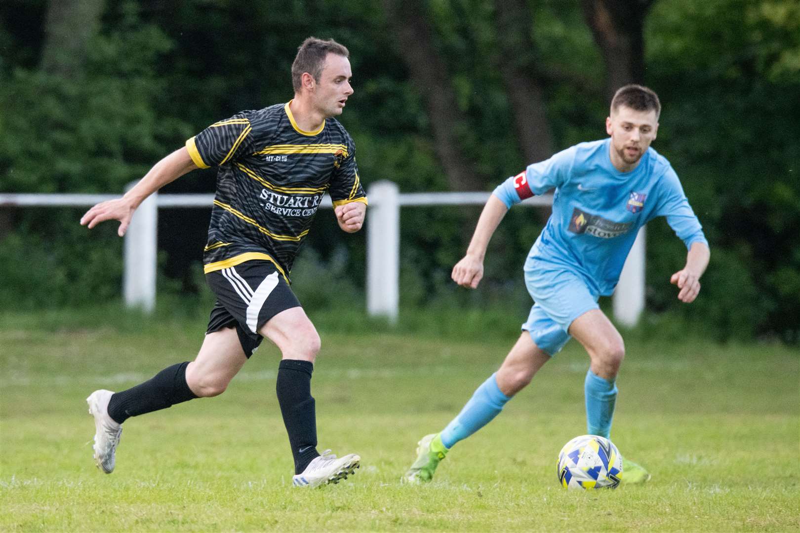 Craig Harrold (left) scored for Lhanbryde in their derby defeat at Fochabers. Picture: Daniel Forsyth..