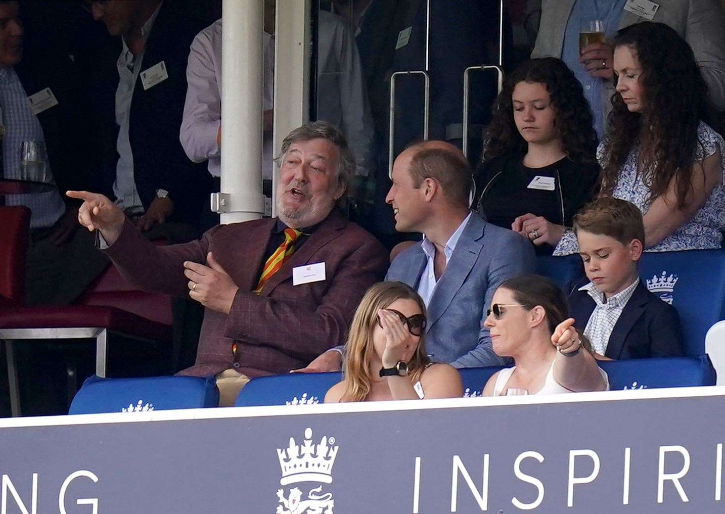 Stephen Fry speaks to the Prince of Wales during day four of the second Ashes test match at Lord’s (Adam Davy/PA)